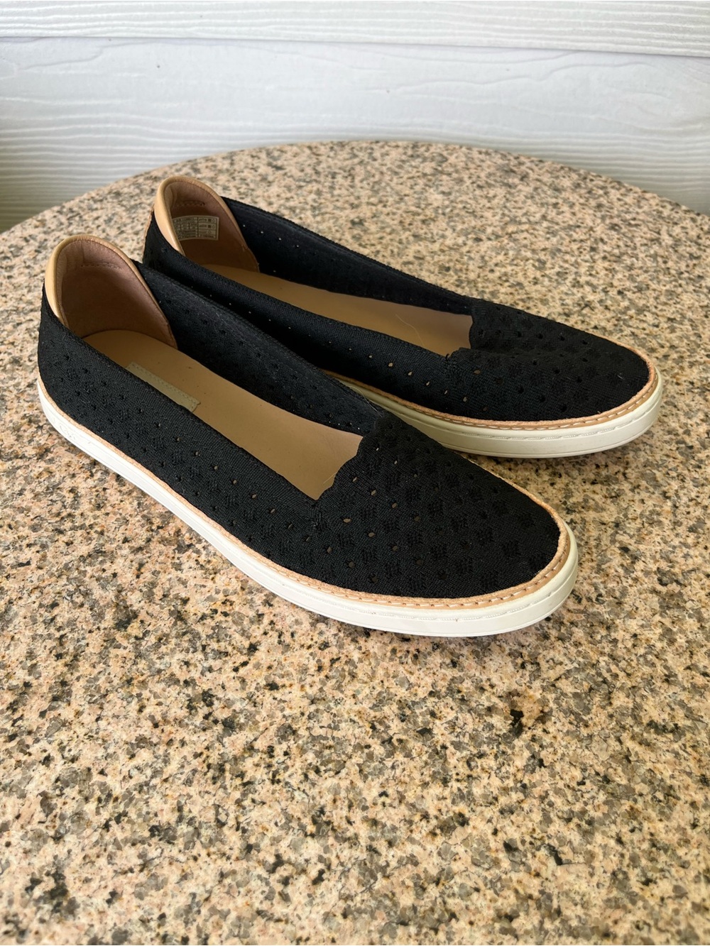 UGG Women’s Black Perforated Knit Slip-On Sneakers with Tan Leather Trim